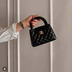 Chanel small Kelly bag. Black calf leather